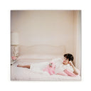 JOAN COLLINS RELAXES BY SLIM AARONS