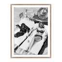 WOMAN SUNBATHING WITH CHIMPANZEE	BY GETTY IMAGES