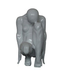 Modern White Kneeling Sculpture