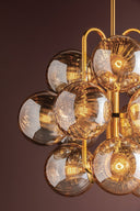 Vintage Polished Brass Cronus Chandelier 34" by Corbett Lighting, view 3