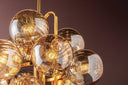 Vintage Polished Brass Cronus Chandelier 34" by Corbett Lighting, view 4
