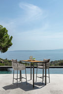 Frame Bar Stool by Talenti, outdoor setting