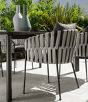 Frame Dining Armchair by Talenti, outdoor setting