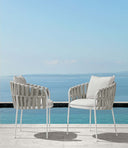 Frame Dining Armchair by Talenti, outdoor setting
