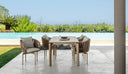 Frame Swivel Dining Armchair by Talenti, outdoor setting