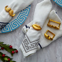 Brass Muse Napkin Rings