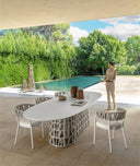 Swipe Dining Table, 118" by Talenti, outdoor setting