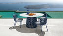 Swipe Armless Dining Chair by Talenti, outdoor setting