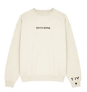 Don’t Be Boring.® Cream Cozy Sweater